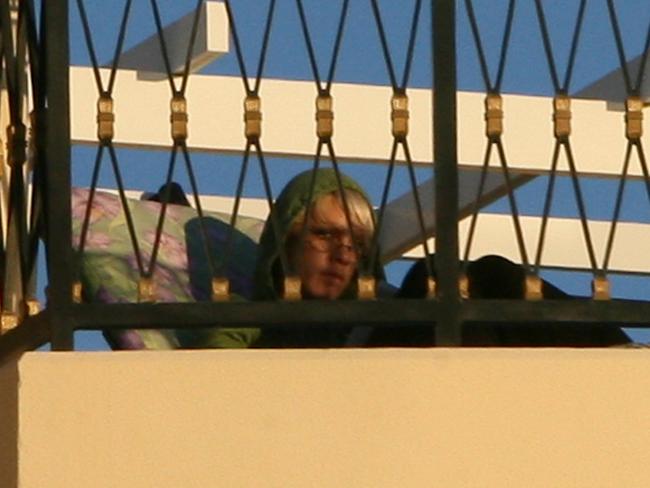 Singer Pink pictured on her balcony at Palazzo Versace.