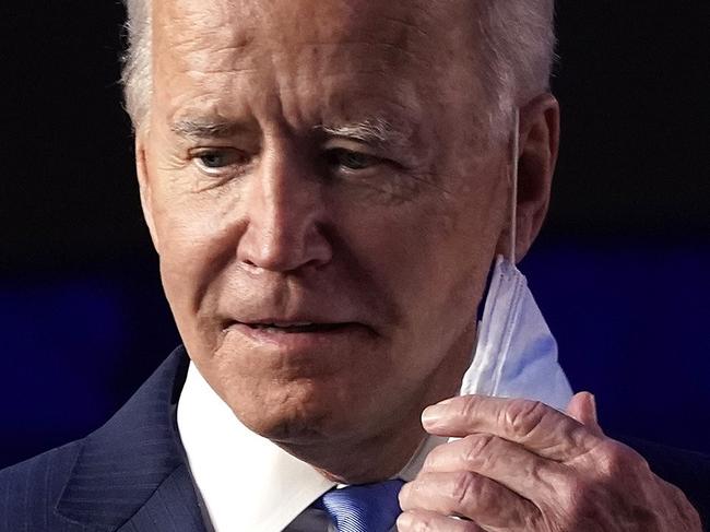 WILMINGTON, DELAWARE - NOVEMBER 06: Democratic presidential nominee Joe Biden takes the stage to address the nation at the Chase Center November 06, 2020 in Wilmington, Delaware. The winner of the 2020 presidential election has yet to be declared, as vote counting continues in the key states of Pennsylvania, Georgia, Nevada, Arizona, and North Carolina.   Drew Angerer/Getty Images/AFP == FOR NEWSPAPERS, INTERNET, TELCOS & TELEVISION USE ONLY ==