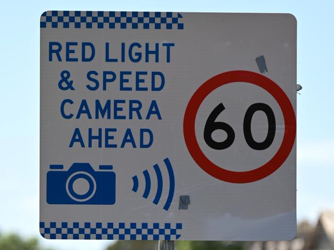 ADELAIDE, AUSTRALIA - NewsWire Photos OCTOBER 5, 2021: Stock/generic images of traffic signs - red light & speed camera/60km sign. Picture: NCA NewsWire / Naomi Jellicoe