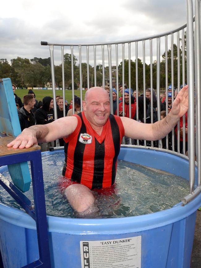 Blackburn president Matt Breen looks for the exit out of the Freeze MND bucket. Picture: Steve Tanner
