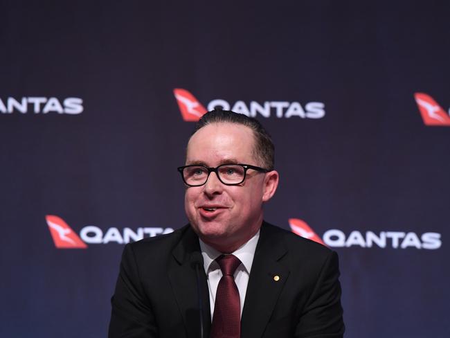Qantas Group Chief Executive Officer Alan Joyce presents the company's half-year financial results in Sydney, Thursday, February 22, 2018. Qantas has announced an 18 percent profit increase. (AAP Image/Dean Lewins) NO ARCHIVING