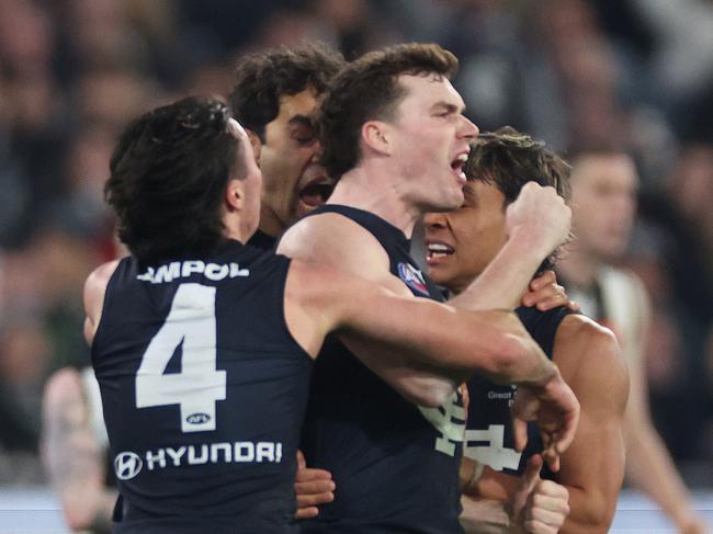 MELBOURNE, AUSTRALIA - AUGUST 03: Blake Acres of the Blues celebrates kicking a goal during the round 21 AFL match between Collingwood Magpies and Carlton Blues at Melbourne Cricket Ground, on August 03, 2024, in Melbourne, Australia. (Photo by Daniel Pockett/Getty Images)