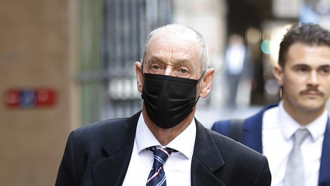 Neil Duncan (left), the convicted ponyclub predator, leaves Downing Centre in Sydney on Friday after his sentence was adjourned. Picture: Sam Ruttyn