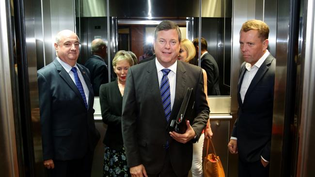 Tim Nicholls MP walking with supporters towards the Partyroom leadership spill. Picture: Liam Kidston