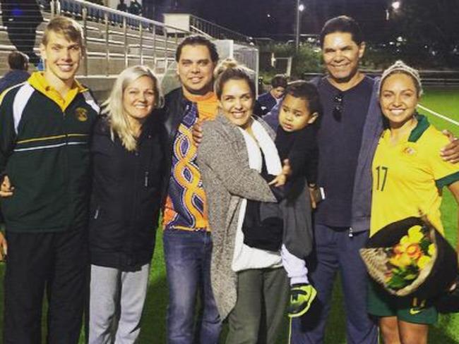 Matildas star Kyah Simon with her family before a recent international friendly against Vietnam.