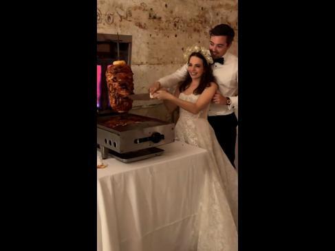 Newly-weds cut kebabs instead of cake on their wedding day