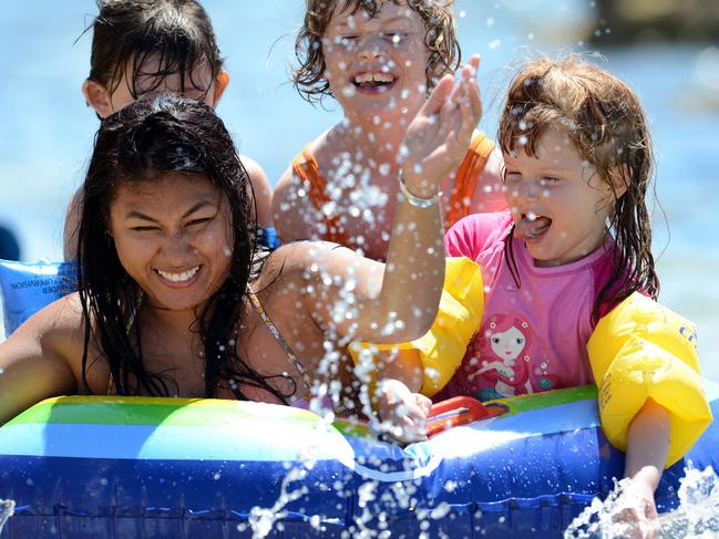 Annie Vocal her daughter Eliza 4 (obscured) and cousins Phoenix 4 (in pink bathers) and Oriana (9) enjoy Mothers Beach in Mornington on New Year’s Eve. Picture: supplied