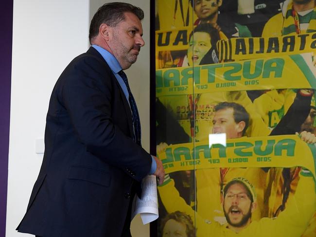 Socceroos coach Ange Postecoglou leaves after speaking to media in Sydney