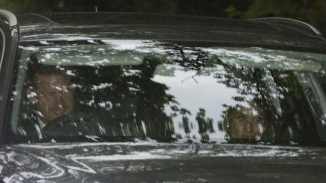 The happy couple arrive at the reception — Prince Harry acting as driver. Picture: News Group Newspapers Ltd.