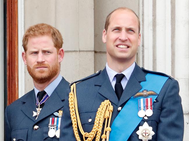 LONDON, UNITED KINGDOM - JULY 10: (EMBARGOED FOR PUBLICATION IN UK NEWSPAPERS UNTIL 24 HOURS AFTER CREATE DATE AND TIME) Prince Harry, Duke of Sussex and Prince William, Duke of Cambridge watch a flypast to mark the centenary of the Royal Air Force from the balcony of Buckingham Palace on July 10, 2018 in London, England. The 100th birthday of the RAF, which was founded on on 1 April 1918, was marked with a centenary parade with the presentation of a new Queen's Colour and flypast of 100 aircraft over Buckingham Palace. (Photo by Max Mumby/Indigo/Getty Images)