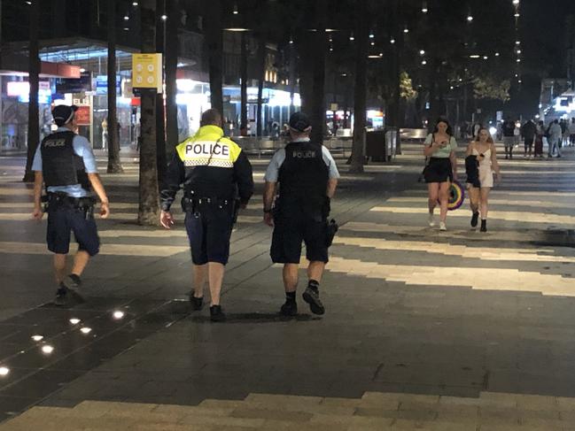 Police officers on foot patrol on The Corso at Manly. Picture: Jim O'Rourke