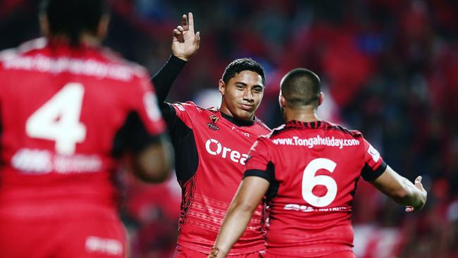 Jason Taumalolo of Tonga celebrates after winning a game.