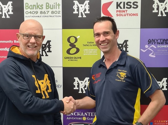 Main Ridge president John McEncroe (left) shakes on it with new coach Gareth Wyatt. Pic: Facebook