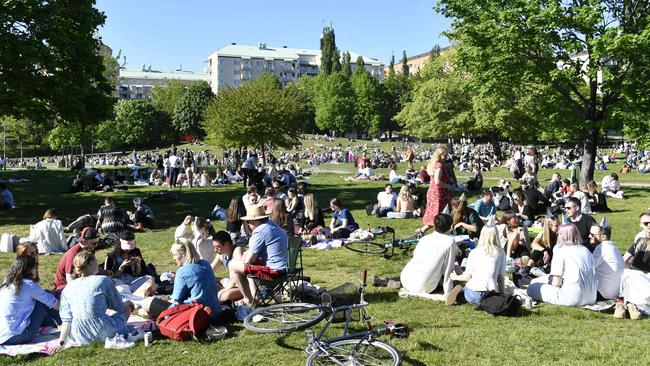 Swedes enjoy the sunny weather in Tantolunden park in Stockholm in May. Picture: AFP