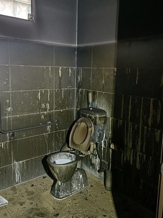 The barbershop’s bathroom was severely damaged in the fire. Picture: Matt Hill