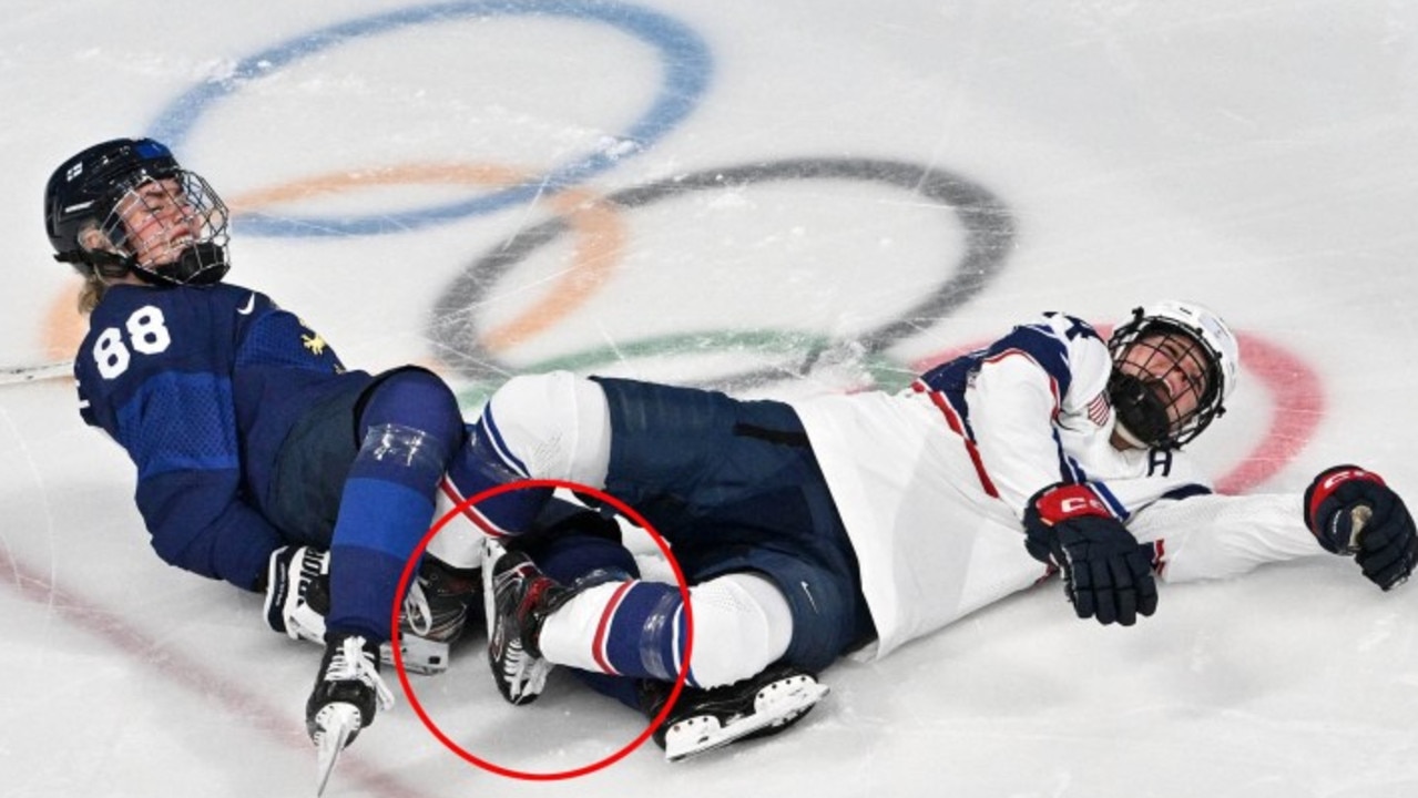 Brianna Decker of Team United States goes down injured. Photo by Bruce Bennett/Getty Images.