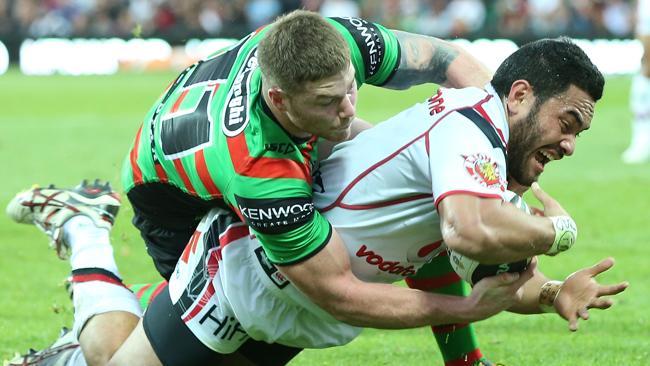 Souths forward Chris McQueen stops the Warriors' Konrad Hurrell in his tracks. Photo by Michael Dodge/Getty Images.