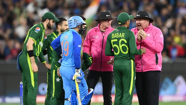 Pakistan captain Babar Azam complains with the umpires. Photo by Quinn Rooney/Getty Images