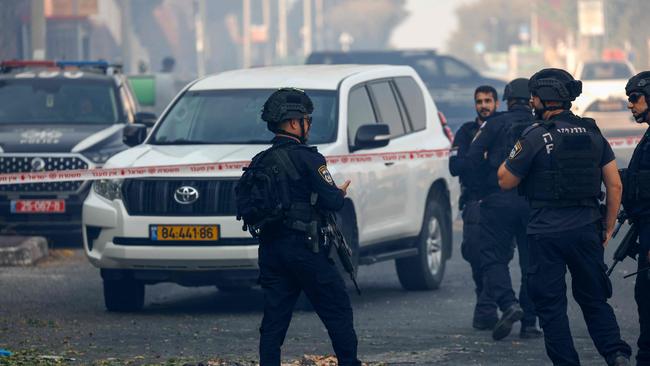 Israeli security forces and emergency personnel deploy at a site hit by rockets fired from Lebanon in the northern Israeli city of Kiryat Shmona. Picture: AFP