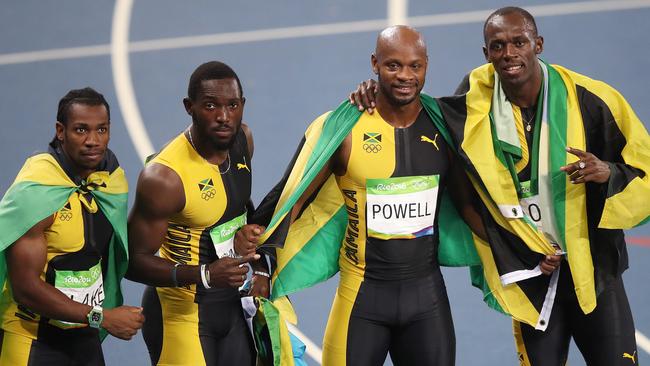 (l-r) Jamaica’s Yohan Blake, Nickel Ashmeade, Asafa Powell and Usain Bolt celebrate after winning the gold medal in the Men’s 4 x 100m Relay Final at the Rio Olympics.