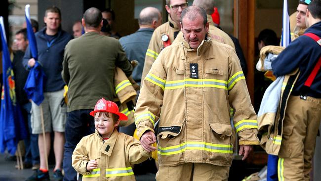 Firefighters at a rally on the steps of Parliament House. Picture: Tim Carrafa