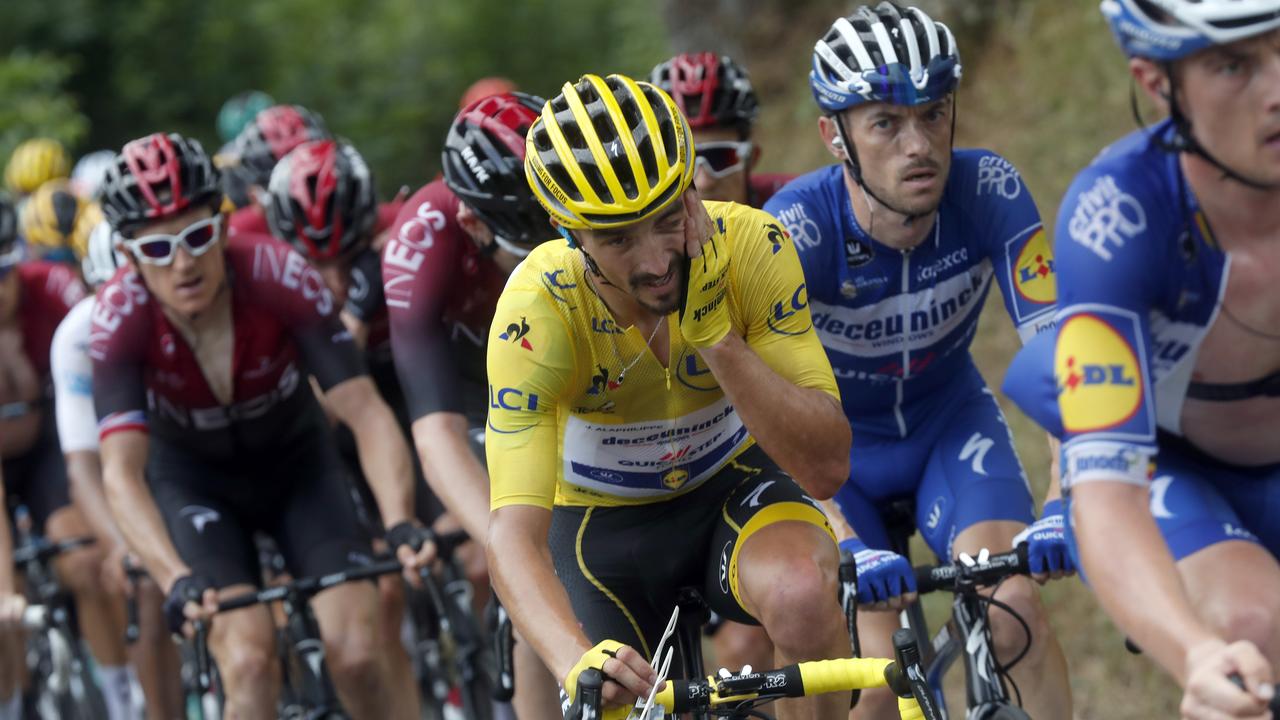 France's Julian Alaphilippe wearing the overall leader's yellow jersey.