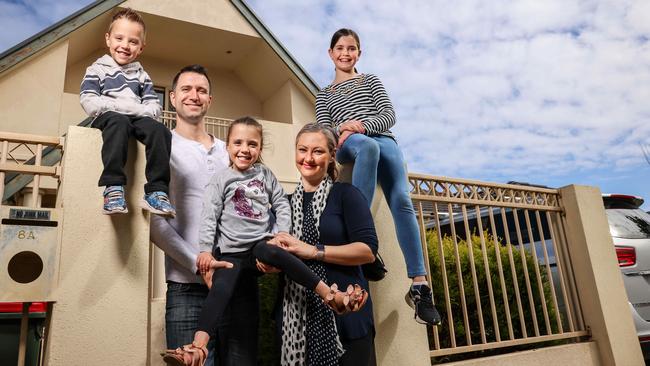 Aidan Silverman and his partner Jaye and kids Ace, Ashley and Violet, at their Dover Gardens house. Picture: Russell Millard