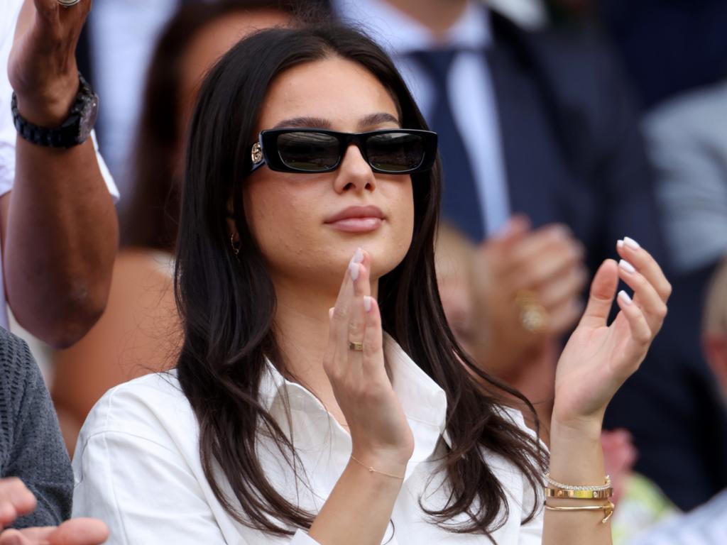 Costeen Hatzi, partner of Nick Kyrgios of Australia watches as Nick Kyrgios of Australia plays against Novak Djokovic of Serbia during their Men's Singles Final match. Picture: Getty Images