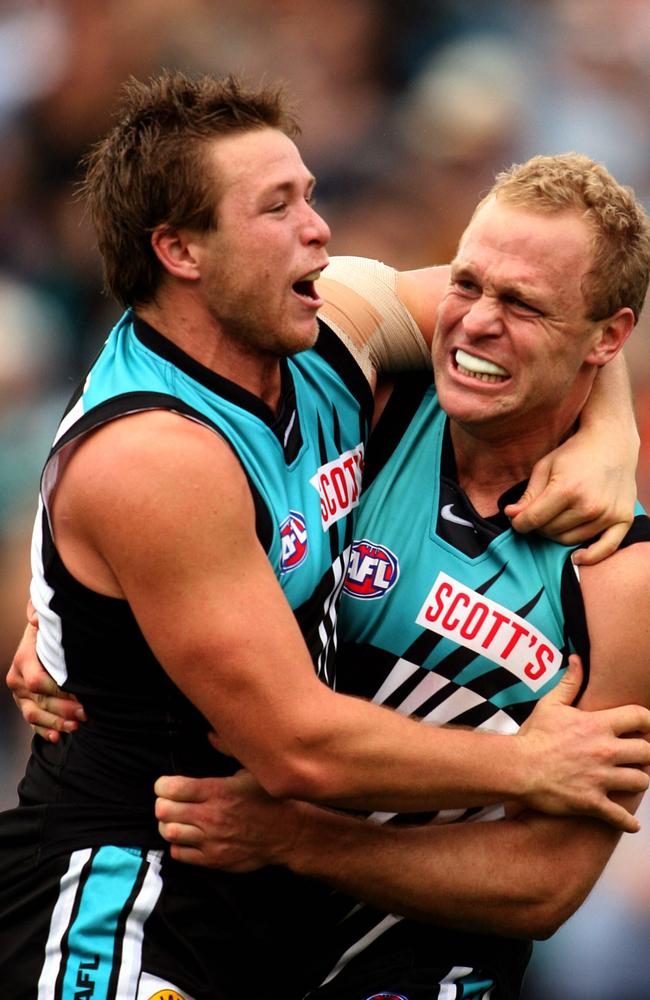 Celebrating a Showdown win with Chad Cornes at Port Adelaide.