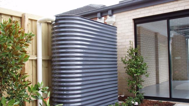 This rainwater tank has been plumbed in but a planning loophole means builders don’t always do the right thing. Picture: File