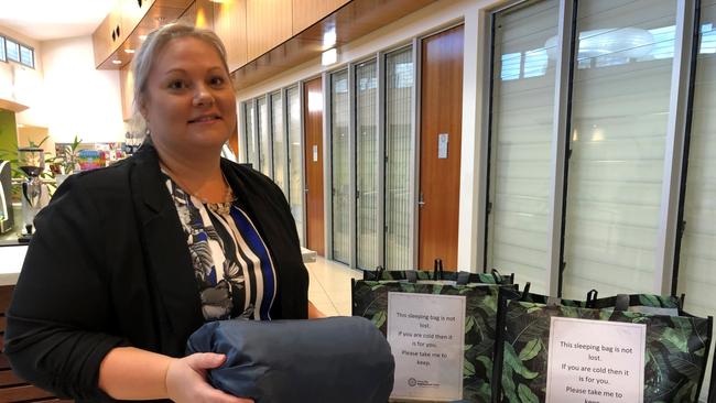 HELPING HAND: Hervey Bay Neighbourhood Centre chief executive Tanya Stevenson with one of the sleeping bags and the included items which are given out to homeless people.