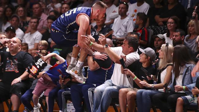 Creek tries to leap Harry Flourentzou (in blue) after saving a beall heading out of play. Picture: Sarah Reed