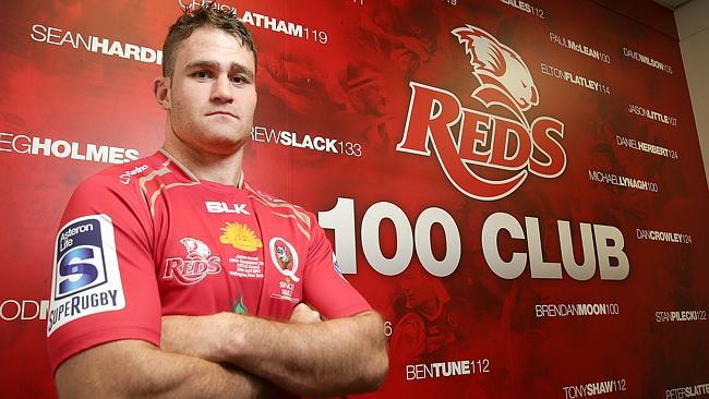 QLD Reds captain James Horwill with the 100 Game honour board.