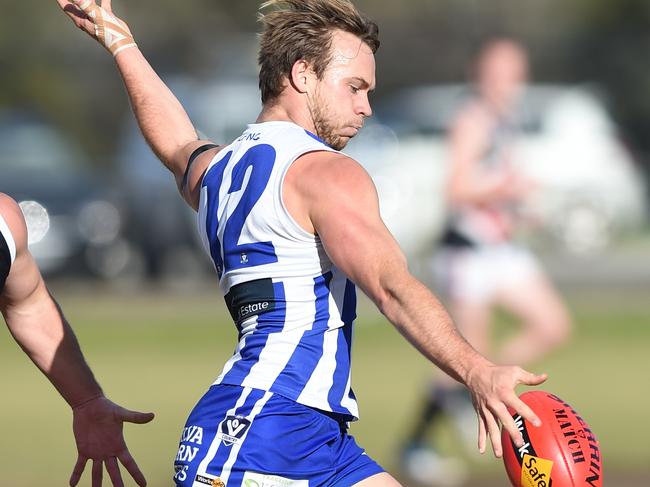 Nick Tuddenham takes a kick for Langwarrin. He’s just completed a season with Balmain Tigers in Syndey. Picture: Chris Eastman