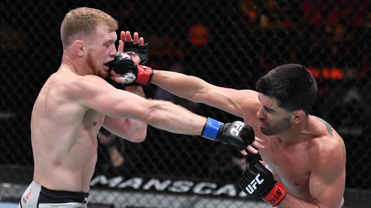 Dominick Cruz (R) beat Casey Kenney in UFC 259, then called out a bizarre opponent.