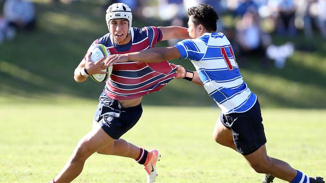 Action pics of the Round 1 GPS Rugby blockbuster between The Southport School and Nudgee College at TSS 2019. Photo of Dion Samuela (TSS) and Robert Mapa. Photo by Richard Gosling