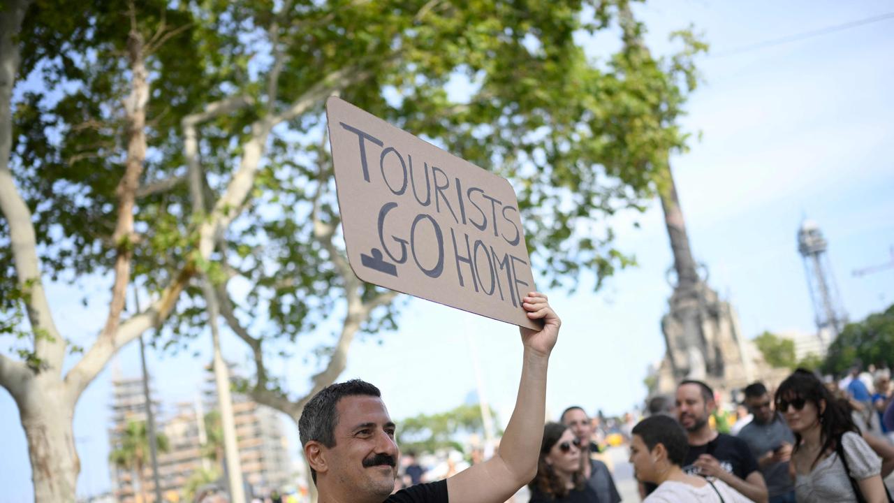 Protests against mass tourism have multiplied in recent months across Spain, the world's second-most visited country. Picture: Josep LAGO/AFP