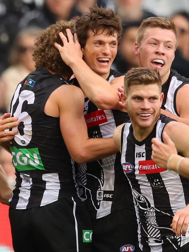Brody Mihocek (centre) was popular after kicking his first career goal last week. Pic: Getty Images