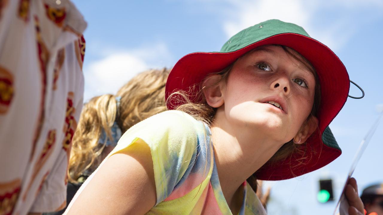 Jasmine Chequer watching the Grand Central Floral Parade of Carnival of Flowers 2022, Saturday, September 17, 2022. Picture: Kevin Farmer