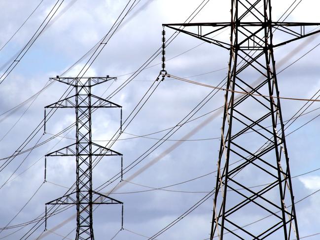 Power lines at the AGL Power Station at Torrens Island in Adelaide, Monday, November 4, 2019.  (AAP Image/Kelly Barnes) NO ARCHIVING