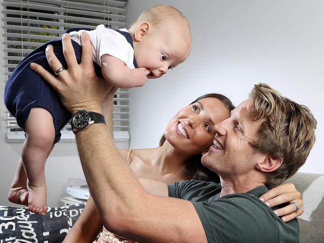 Crows captain Rory Sloane at home with wife, Belinda, and son, Sonny, before his 200th game this weekend. Picture: Sarah Reed.