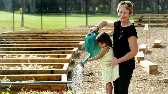 Lily Nabung -2 and her mum Marika Nabung at Rose Bay Community Garden in its early days. Picture: John Appleyard