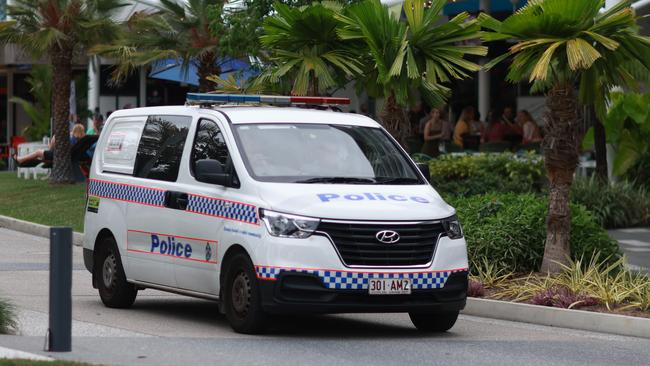 A police car patrols along the Cairns Esplanade dining precinct. Picture: Brendan Radke