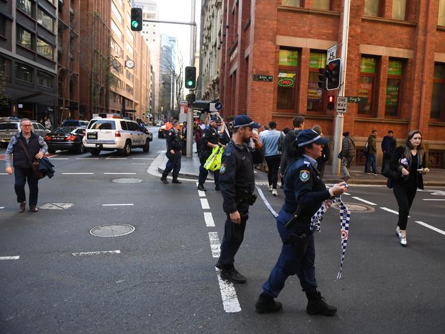 The police operation at the corner of King and York Street in Sydney after reports of the stabbing occurred. Picture: AAP