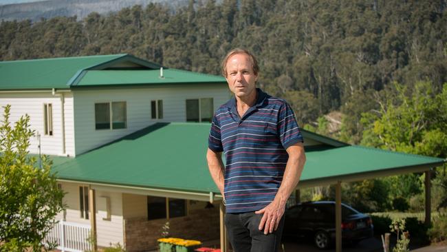 Dr Lachlan Fraser at his rebuilt property in Marysville. Picture: Sharon Walker