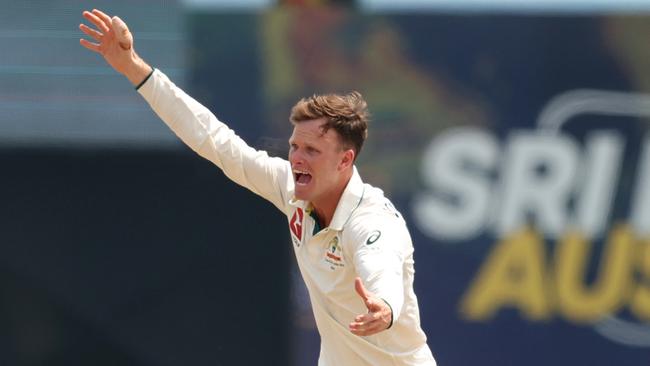 GALLE, SRI LANKA - FEBRUARY 08: Matthew Kuhnemann of Australia celebrates after taking the wicket of Dimuth Karunaratne of Sri Lanka during day three of the Second Test match in the series between Sri Lanka and Australia at Galle International Stadium on February 08, 2025 in Galle, Sri Lanka. (Photo by Robert Cianflone/Getty Images)