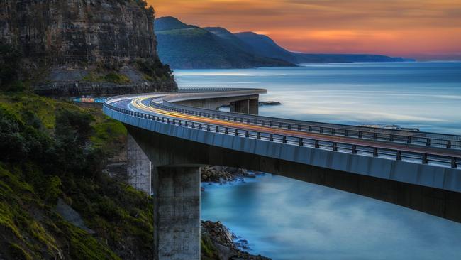 A man was hanging from the railing of the Sea Cliff Bridge, south of Sydney. Picture: istock