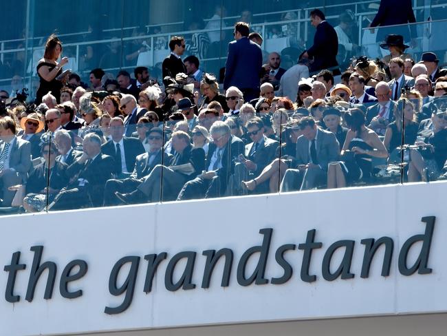 A packed grandstand watches on at Derby Day. Picture: Jay Town