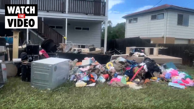 Flood-damaged furniture piled up in Brisbane suburbs