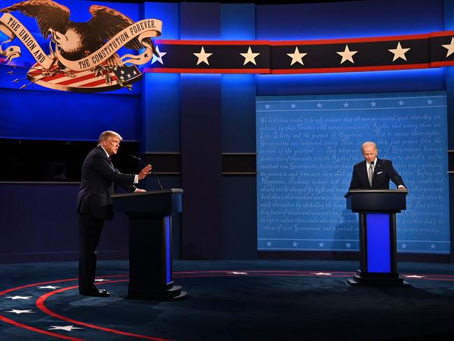 US President Donald Trump (L) and Democratic Presidential candidate and former US Vice President Joe Biden exchange arguments during the first presidential debate at the Case Western Reserve University and Cleveland Clinic in Cleveland, Ohio on September 29, 2020. (Photo by Jim WATSON / AFP)